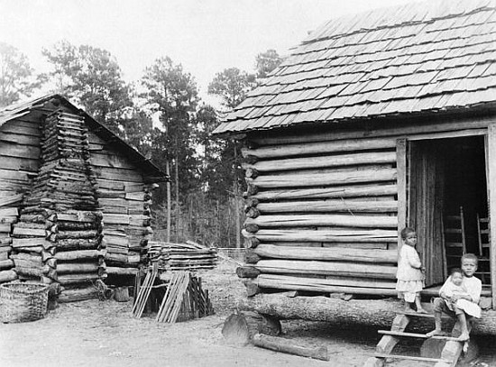 Log cabins in Thomasville, Florida, c.1900 a American Photographer