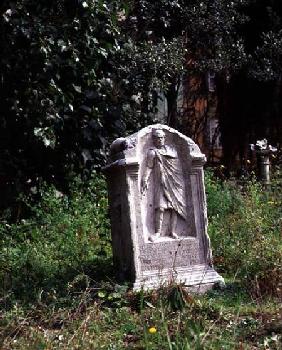 View of the garden with a Roman tombstone