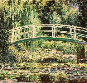 Ponte nel giardino di Monet con ninfee bianche