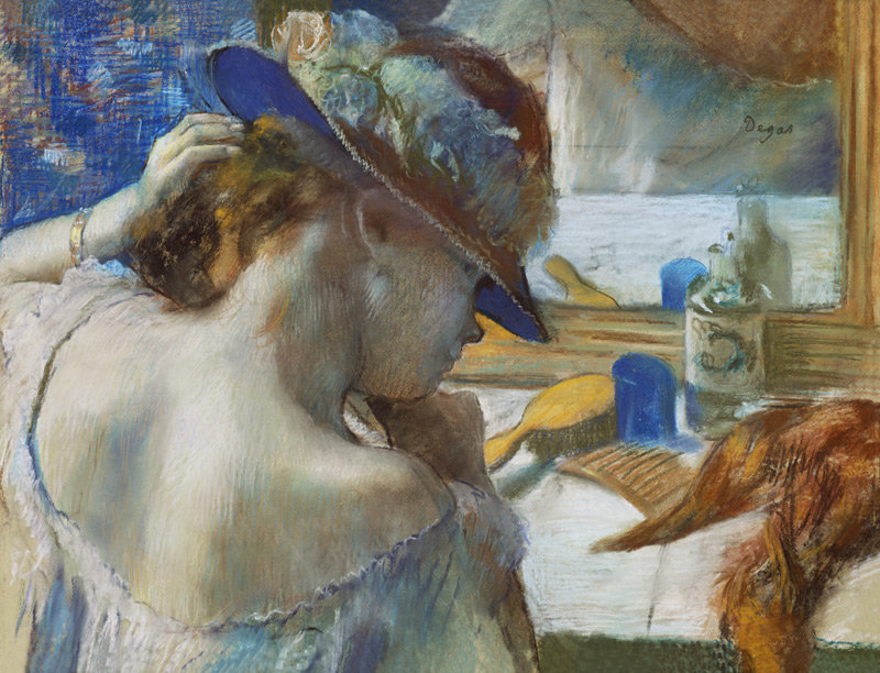Di fronte allo specchio a Edgar Degas