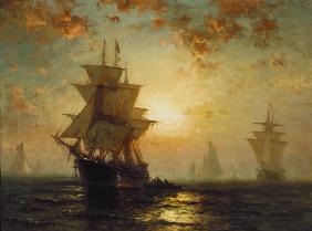Sailing ships at sunset