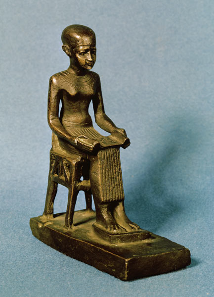 Seated statue of Imhotep (fl.c.2980 BC) holding an open papyrus scroll, Late Period a Egizi