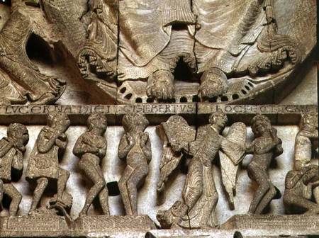 West Portal tympanum depicting the Last Judgement: detail of Christ's feet, an angel and mortals a Gislebertus