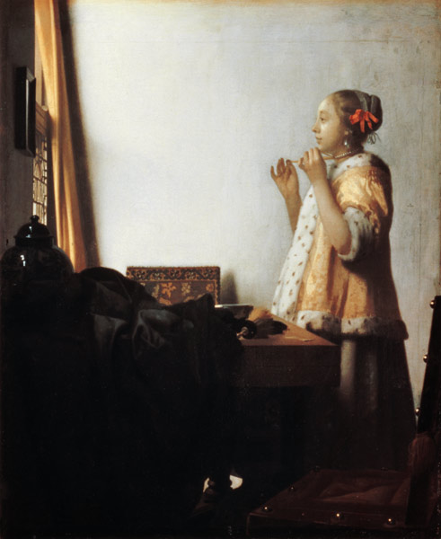 Woman with a Pearl Necklace a Johannes Vermeer 