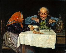 Old smallholder couple at the meal. a Karl Kronberger