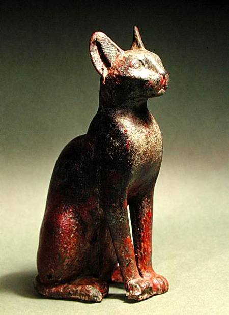 Statuette of a cat with gold earrings, the sacred representation of the goddess Bastet a Late Period Egyptian