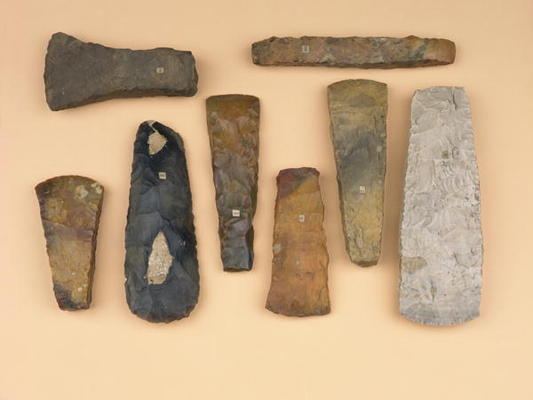 Collection of Neolithic to early Bronze Age weapon heads including Scandinavian stone battle and Dan a 