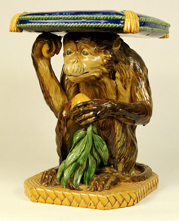 A Minton ''Majolica'' Garden Seat Modelled As A Crouching Monkey Supporting A Cushion On His Head, C a 