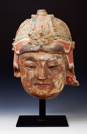 An Unusual Large Stucco Head Of A Guardian, 13th/14th Century a 