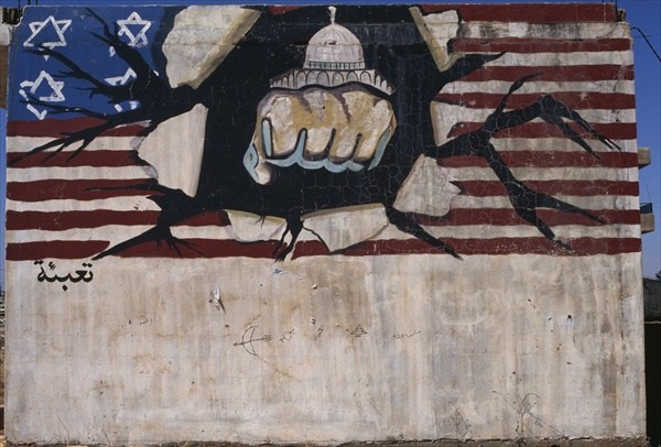 Mural depicting the Hezbollah punching the American flag (colour photo)  a 