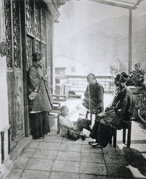 Servants smoking tobacco on their master''s veranda, from Illustrations of China by J Thompson, 1873 a 
