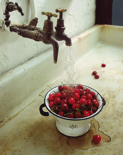 Washing cherries, 1988 (colour photo)  a Norman  Hollands