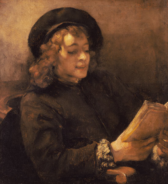 Titus van Rijn, the son of the artist, reading. a Rembrandt van Rijn